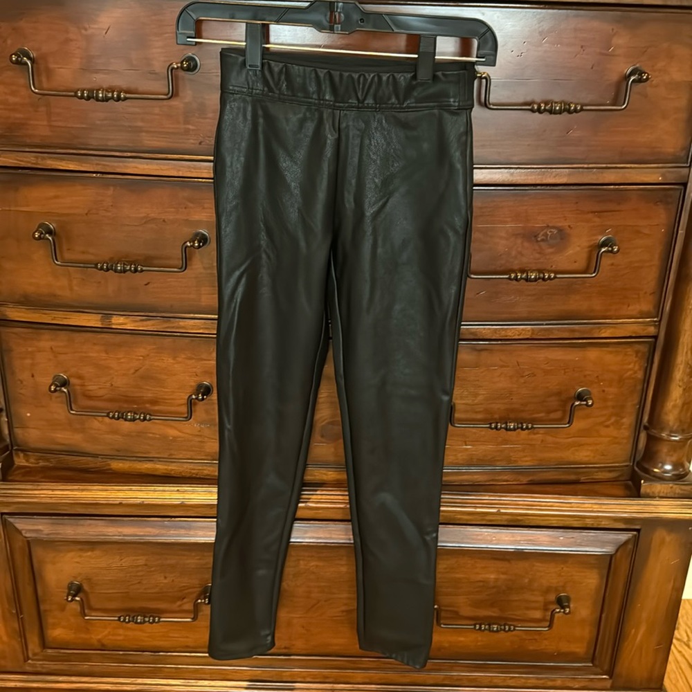 Tractr faux leather black leggings. Size 10. Stretch waistband. EUC